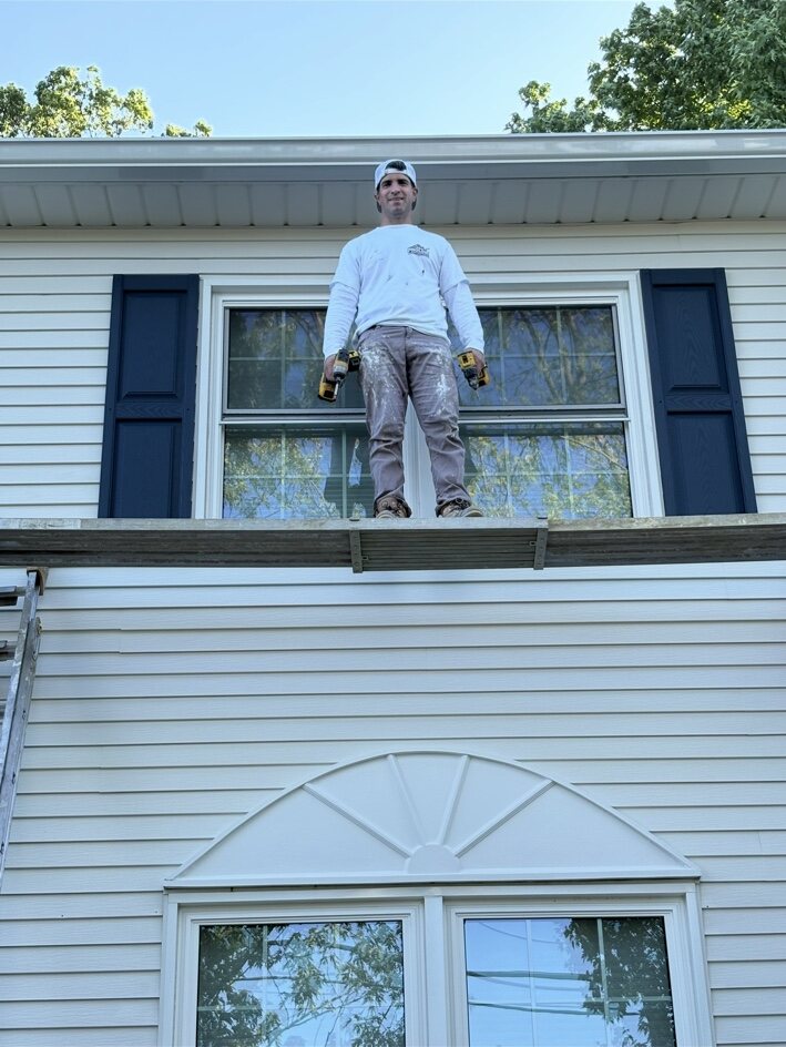 Vincent working on a residential exterior