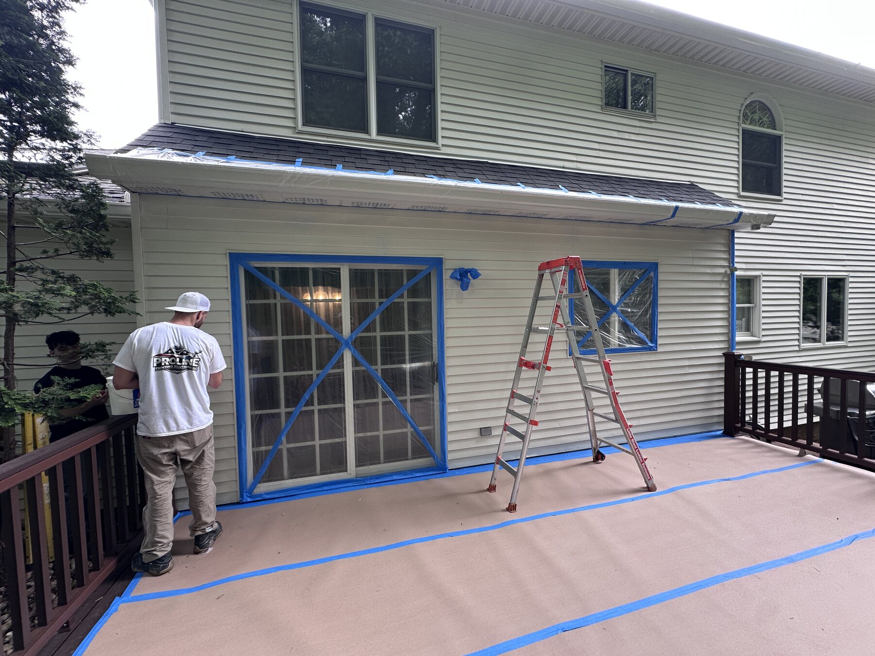 Residential exterior protected before painting