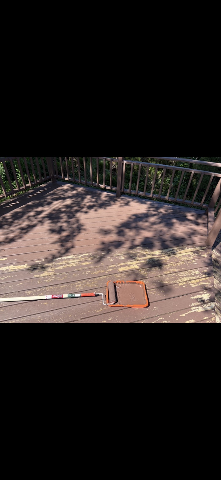 Deck coating being applied